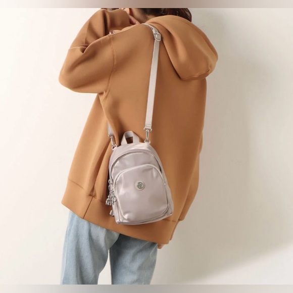 Kipling Handbags - Kipling Mini Backpack Crossbody in pewter
